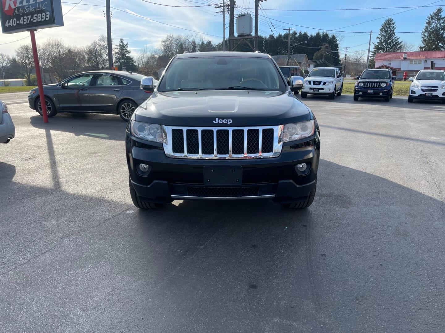 2013 Black /Gray Jeep Grand Cherokee (1C4RJFCG5DC) , located at 547 E. Main St., Orwell, OH, 44076, (440) 437-5893, 41.535435, -80.847855 - Photo#1